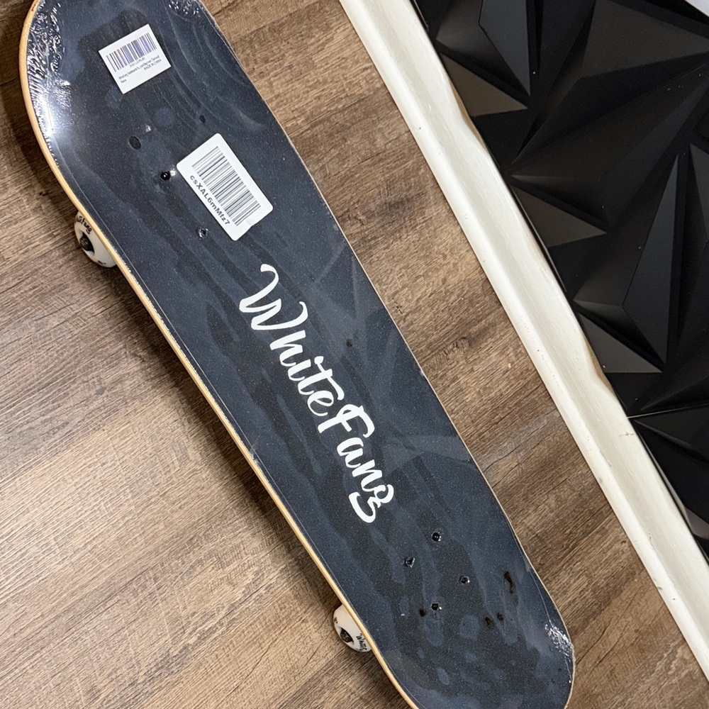 Geometric Pattern Skateboard With White Wheels - image 2